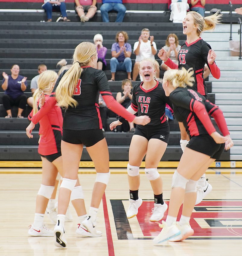 ELC players had plenty to celebrate in earning a five-set victory over North Union after the Warriors had taken a 2-0 lead last Thursday. From left are Mara White, Piper Quastad, Hillary Ruschy, Haley Nissen and Jersie Nitchals.  Photo by David Swartz