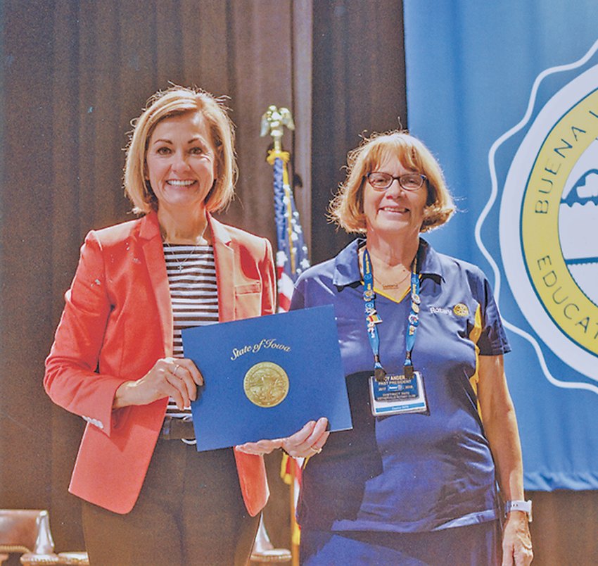 Nancy Anderson accepted the Governor&rsquo;s Volunteer Award from Gov. Reynolds and Lt. Gov. Gregg in Storm Lake.