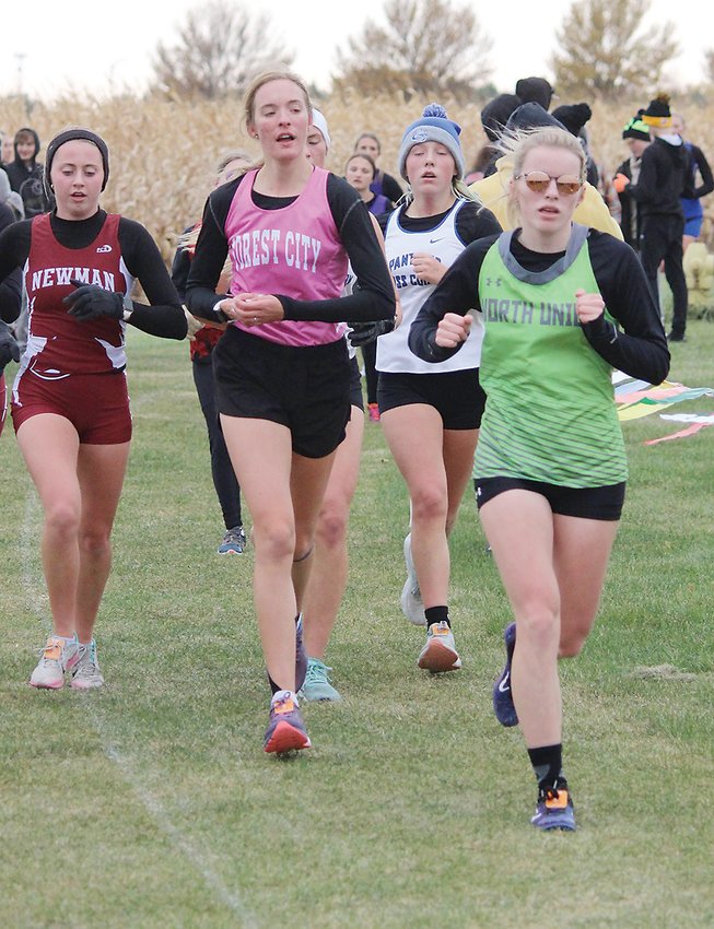 North Union&rsquo;s Hannah Morphew, right, leads a group of runners at the Top of Iowa Conference Meet last Thursday in Mason City.