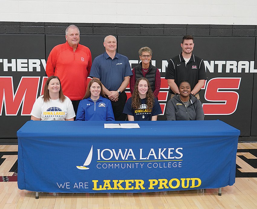Jordyn Stokes signed a letter intent Tuesday to play at Iowa Lakes Community College next season. Front from left are mother Sarah Stokes, Iowa Lakes head coach Ashley Martin, Jordyn Stokes, Iowa Lakes assistant coach Shauntesha Bryant; back row: ELC basketball coaches Don Martindale, Scott Stokes (father), Annie Kalous and Mitch Krein.  Photo by David Swartz