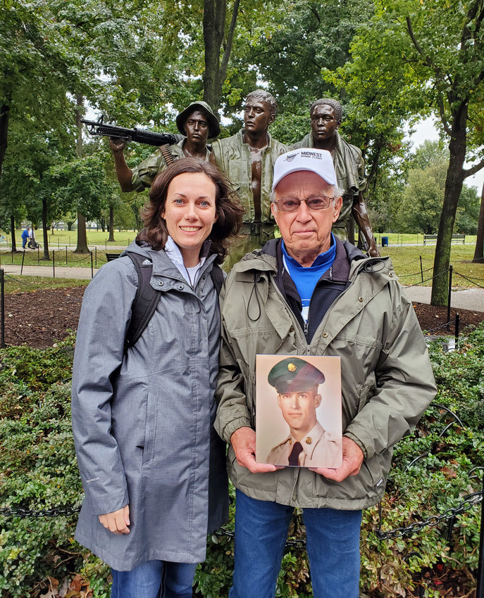 Ken Haisman and his daughter, Angie Baldwin, stop in front of a Vietnam Veterans Memorial while on their trip to Washington, DC with Midwest Honor Flight. Photo courtesy of Ken Haisman.