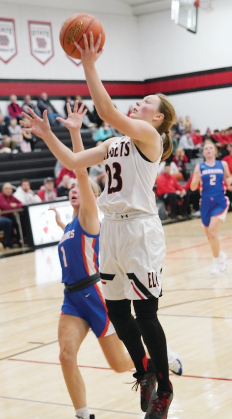 Estherville Lincoln Central sophomore Haylee Stokes (23), the Class 3A State All-Tournament Team Captain from last season, returns to lead the Midgets in the 2022-23 season. Above, Stokes makes a layup in last week&rsquo;s Achieve Scrimmage against Sioux Central.  Photo by David Swartz