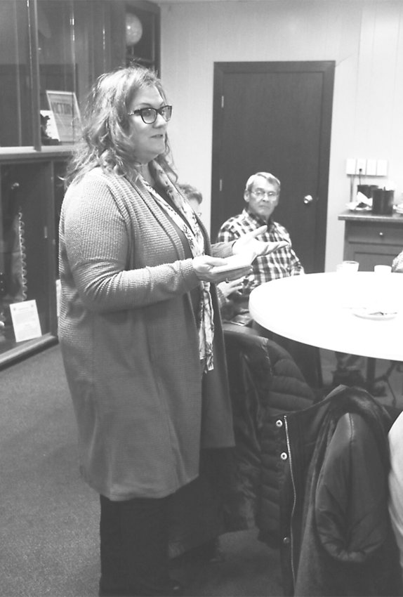 Stacie Berg-Nelson of the Peterson Point Preservation Foundation told Emmet County Historical Society members of upcoming foundation events.  Photo by Michael Tidemann