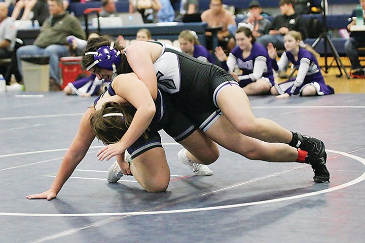 GT/RA&rsquo;s Macy Higgins begins her move toward a pin as the Titans&rsquo; girl&rsquo;s wrestling team saw its first action on Monday in Pocahontas.  Photo courtesy Pocahontas Record-Democrat