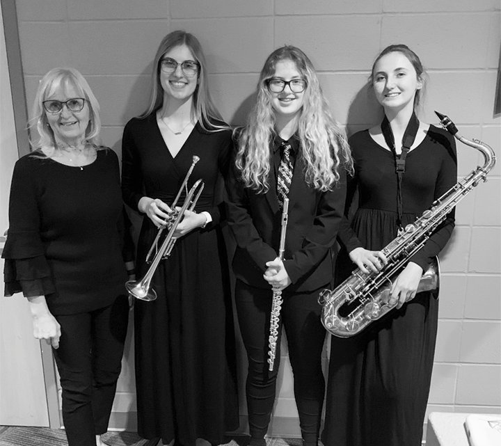 Three Iowa Lake Community College students were selected to participate in 2022 Iowa Collegiate All-Star Honor Concert Band. From left to right: Carol Ayres, Director; Haily Green, trumpet; Annika Poeppe, flute; Shelby Hoff, tenor sax.