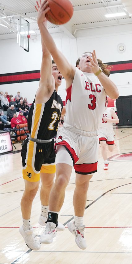 ELC&rsquo;s Alex Sheridan (3) is fouled on this breakaway layup against Cherokee last Friday. The senior scored 10 points in the Midgets&rsquo; victory.  Photo by David Swartz