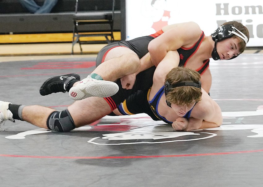 ELC senior Cade Crees went 2-3 at the Lake Mills Tournament last Saturday. Above, Crees won this match against Cherokee earlier this month.  Photo by David Swartz