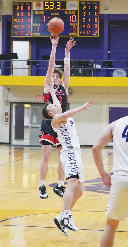 Owen Larson made three 3-pointers with his third one helping him reach 1,000 points for his career at Spencer.  Photo by David Swartz