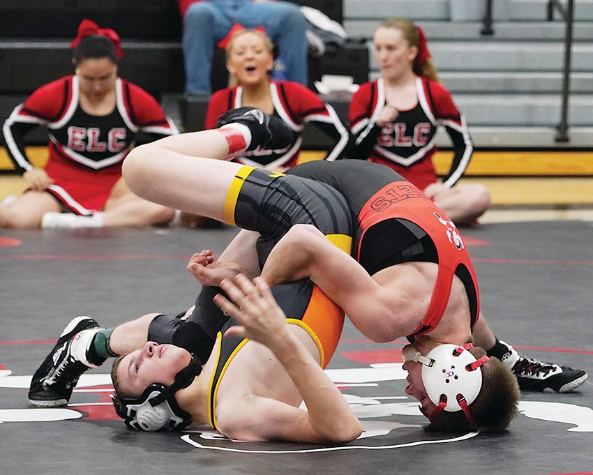 ELC&rsquo;s Austin Hansen earned his 100th career win last Friday. Above, Hansen pinned this foe as part of his path to 100.  Photo by David Swartz