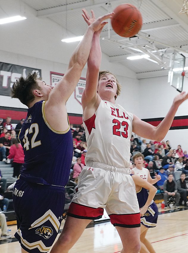 ELC&rsquo;s Jordan Jensen is fouled on the way to the basket during the Jan. 24 game against Spencer.  Photo by David Swartz