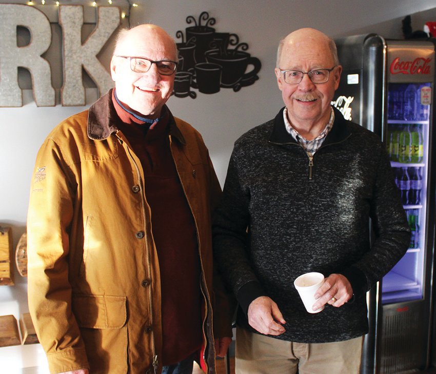 Al Blum, left, said when he hired Lyle Hevern 40 years ago, Estherville was in a tough place. Blum said under Hevern&rsquo;s leadership, the town has diversified and found new ways to attract, retain and build businesses.   Photo by Amy H. Peterson