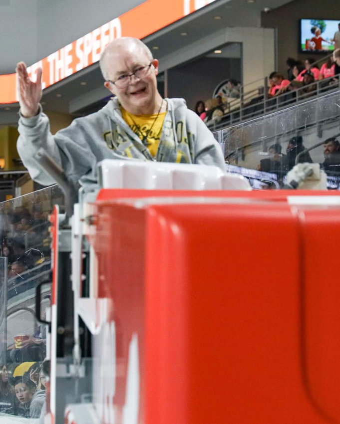 John Bunge was all smiles during his ride on the Zamboni at the Heartlanders hockey game this past weekend at the Xtreme Arena in Coralville.