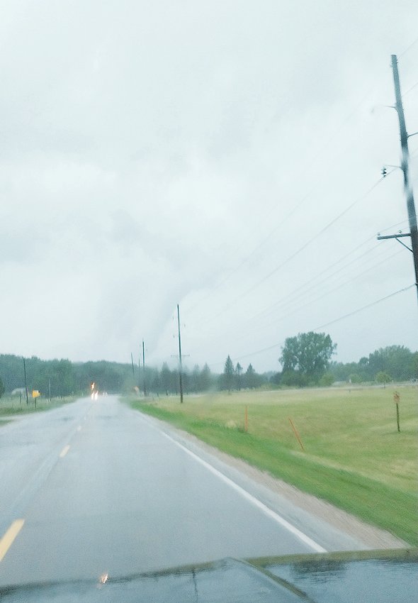 A funnel cloud was seen on the west side of Estherville last July. This submitted photo shows the tornado from the south.