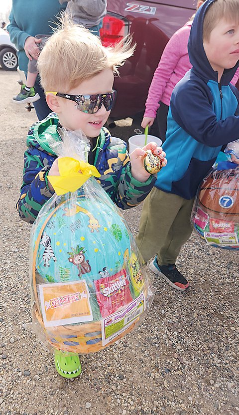 Kasyn Walker found a golden egg that earned him a larger prize at the Estherville Egg Hunt sponsored by the Estherville Parks and Recreation Board held at Spurgin Park last Saturday. For more pictures from the egg hunt, turn to Page 2 of today&rsquo;s Estherville News.