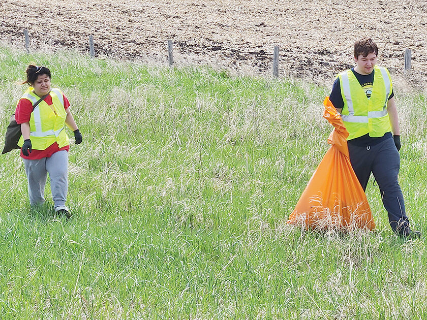 Claudia Torres, Fonda, and Colton Urban, Truman, Minn., were part of Drew Howing&rsquo;s biology class who Tuesday, May 9 picked up litter from the rest stop on the west side of Estherville to the Dickinson County line. Urban is a member of Howing&rsquo;s biology class.