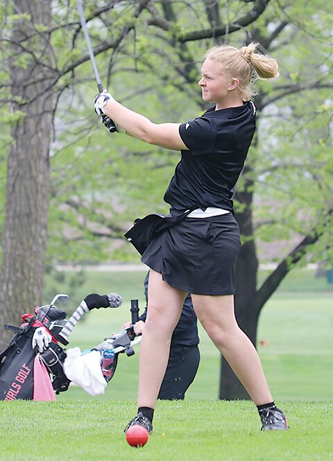 ELC&rsquo;s Emily Paulson hits a drive during play last Friday in Emmetsburg.