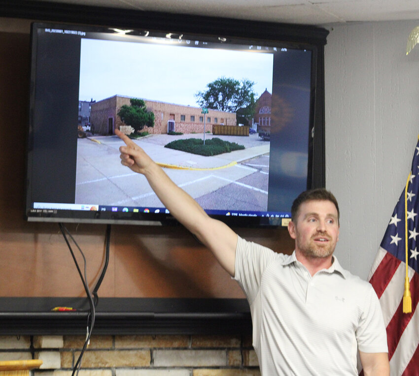 Matt Watt points out new windows on a presentation about his new CrossFit facility coming to Estherville in August.