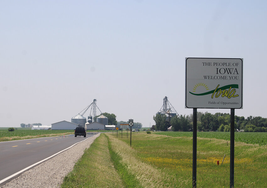 Looking south from the southern border of Minnesota, vehicles travel without delay on the stretch of Highway 4 extending from Estherville&rsquo;s northside to the Minnesota border.