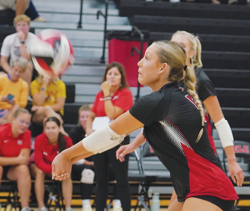 Class 3A No. 14 Estherville Lincoln Central posted a 4-1 record and won the tournament at Clarion this past Saturday. Above, Kali Thiel hits a return during last week&rsquo;s season-opening victory over Sioux Central.