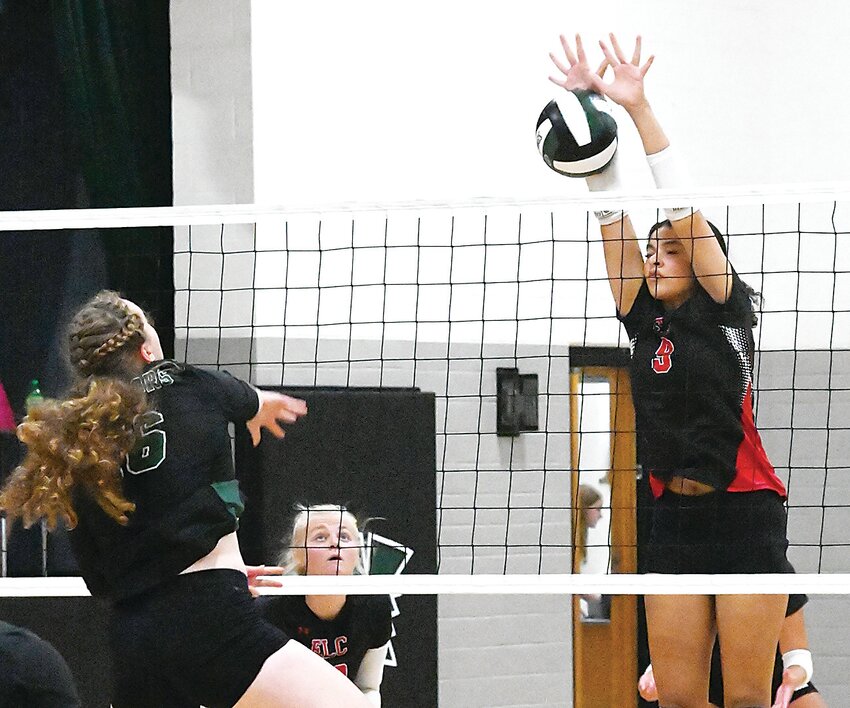 ELC&rsquo;s Saharia White blocks an attack by North Union&rsquo;s Olivia Merrill during the two teams&rsquo; meeting in Armstrong last Thursday. Also, ELC&rsquo;s Jersie Nitchals (pictured) earned her 1,000 career assist during the match.