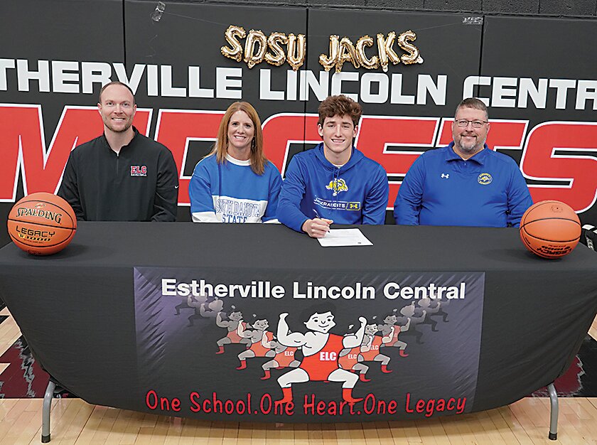 ELC senior Owen Larson signed a letter of intent to continue his basketball career at South Dakota State University. From left are ELC coach Nick Gruhlke, Larson&rsquo;s mom, Angela Larson, Owen Larson, and dad Troy Larson.