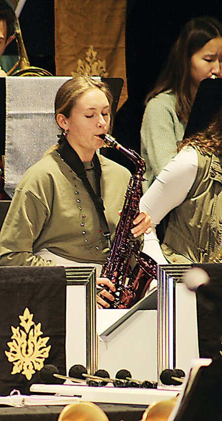 Faith Lutat, ELC &lsquo;23, played a solo on her signature red saxophone.