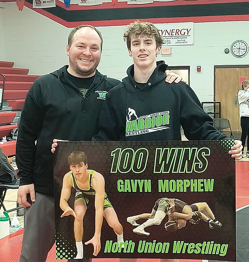 North Union&rsquo;s Gavyn Morphew, right, poses with coach Joe Johnson after the senior earned his 100th career victory last Thursday at West Fork High School in Sheffield.