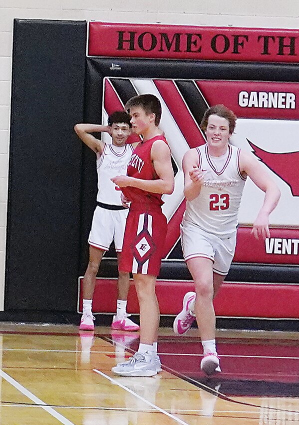 ELC’s Aaron Armstrong and Jordan Jensen  react after Forest City’s final shot rimmed out in Tuesday’s district final.