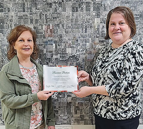 Emmet County Auditor Heidi Goebel presented Auditor&rsquo;s Assistant Roxanne Budach with her SEAT 3 State Election Administrator Training certificate after the March 19 Emmet County Board of Supervisors meeting.