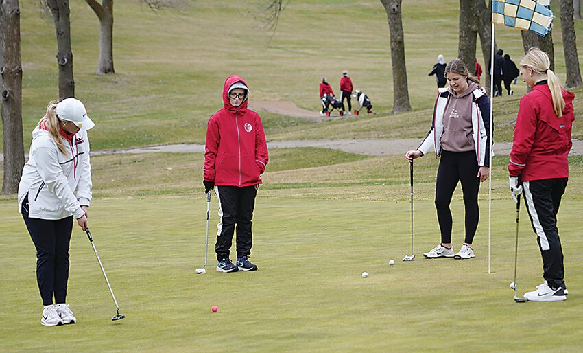 The wind was brisk Monday afternoon as Emily Paulson and the Estherville Lincoln Central Girls Golf Team hosted Spirit Lake. Paulson earned medalist honors with a 47.