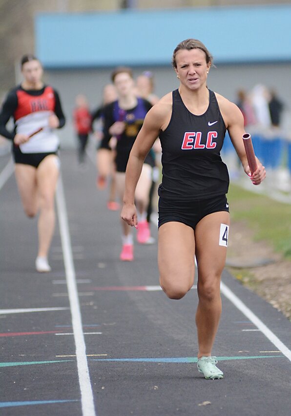 ELC senior Jasey Anderson finishes strong to help the Midgets win the sprint medley relay at the Wildcat Relays in Humboldt on Monday.