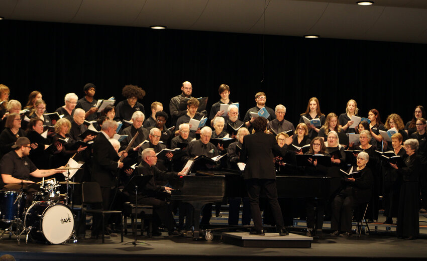 The mass choir of the Many Voices Choir and the Iowa Lakes Community College Choir performed Andrew Lloyd Webber in Fridays concert at Iowa Lakes Community College. For more on the event, turn to Page 2A of today&rsquo;s Estherville News.