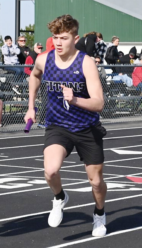 GT/RA&rsquo;s Landen Dietrich begins the 4x800-meter relay for the Titans.
