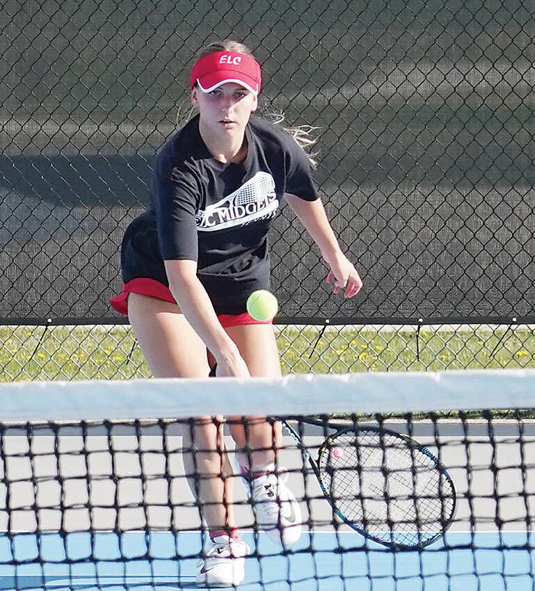 Estherville Lincoln Central’s Hannah Nitchals hits a return during a recent match in Estherville.
