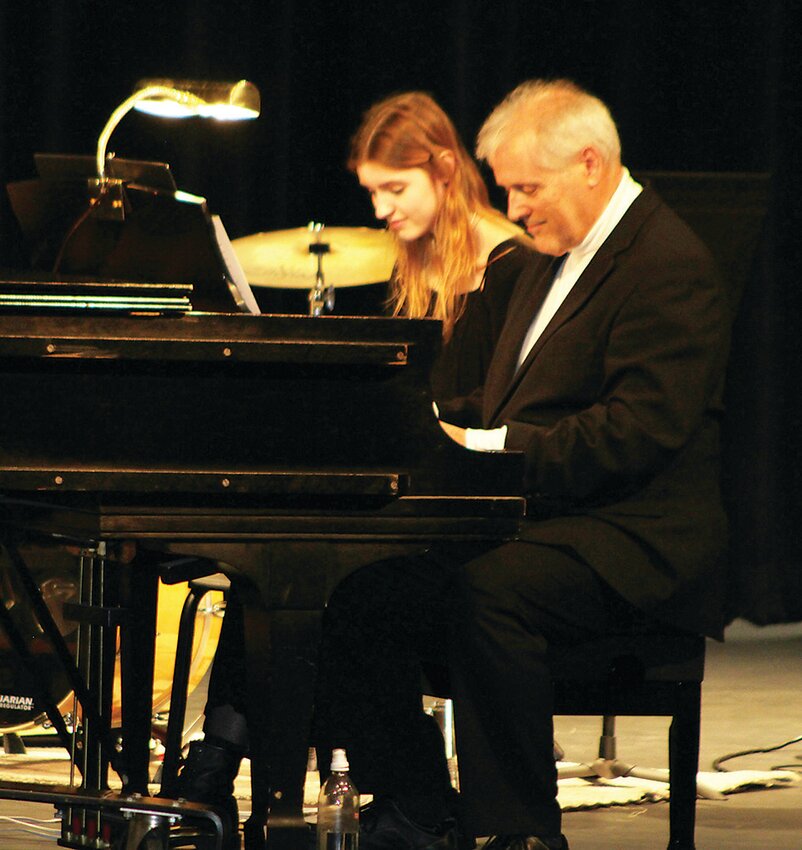 Daughter and father, Sophia and Tim Schumacher collaborated on piano blues during intermission at the concert.