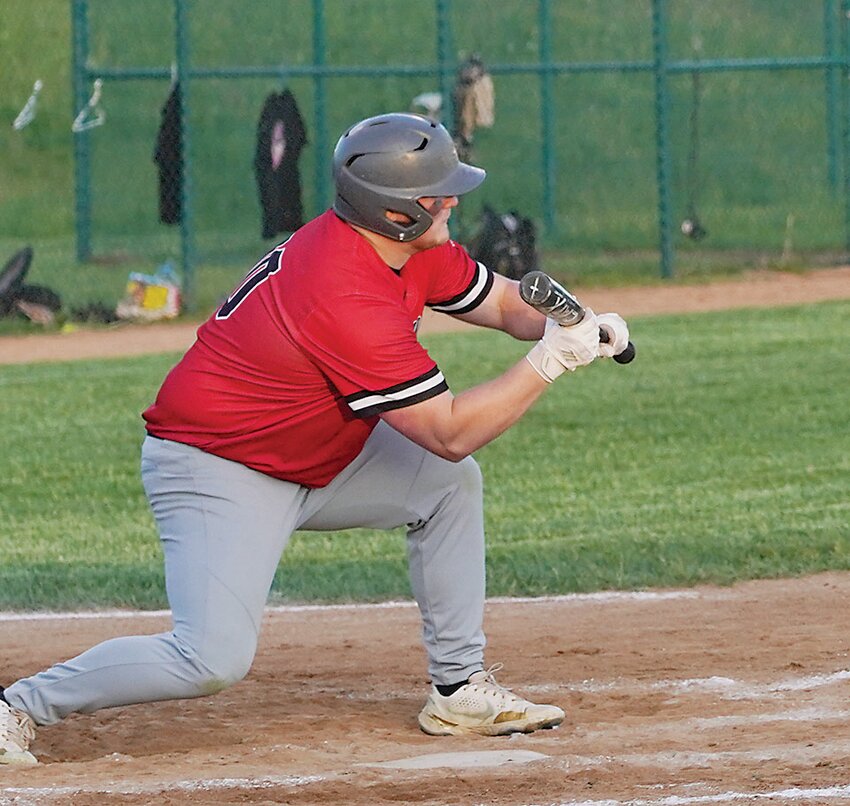 ELC&rsquo;s Asher Molacek lays down a bunt during last week&rsquo;s game against Bishop Garrigan last week.