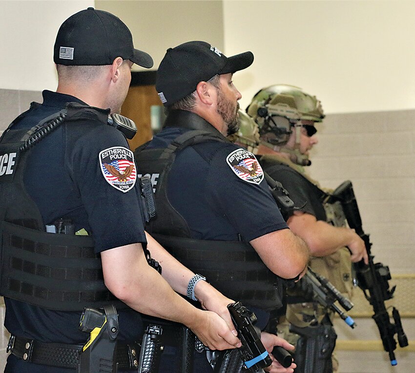 Estherville police prepare to engage an active shooter in a drill held Wednesday, June 12 at the North Union schools.