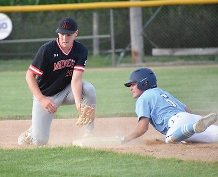 The ball came to ELC shortstop Cael Miller a little too late on this play at second base during Tuesday’s playoff game in Spencer.