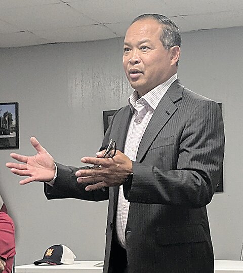 After attending his first school board meeting Monday evening, new ELC superintendent Aiddy Phomvisay gave the program at the Estherville Noon Kiwanis meeting on Tuesday.