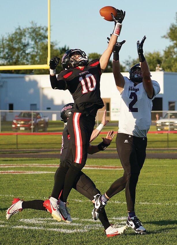 ELC’s Sincere McMurran (10) knocks down a pass intended for OABCIG’s Jaxx DeJean during the first quarter of Friday’s season opener for both teams.