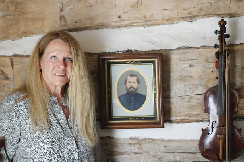 Kaaren Hall brought her portrait of her second-great grandfather, Nils, from California. The portrait had been passed through the generations and was now at home in the farmhouse where Nils grew up.