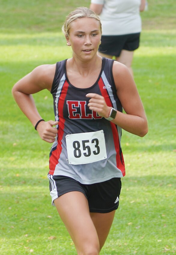 ELC senior Rylee Yager charges up the final hill at the ELC Invitational on Tuesday at the Estherville Golf Course.