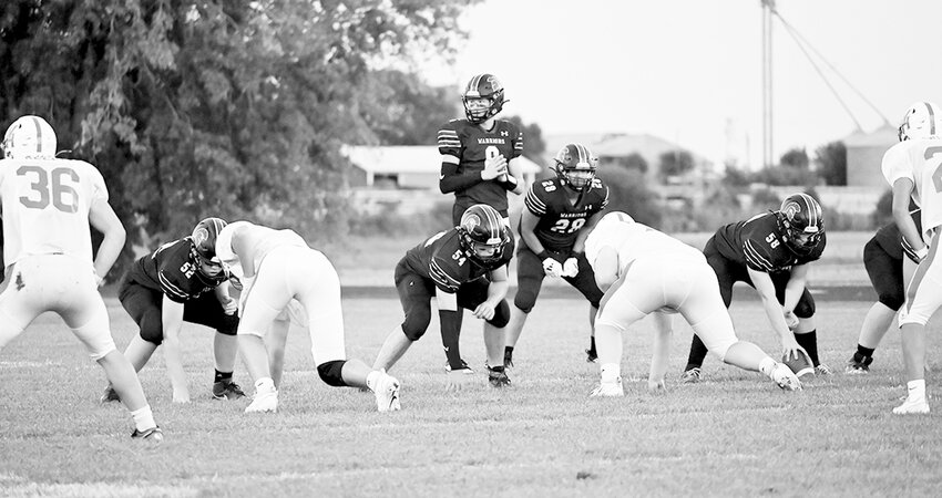 North Union’s offensive line prepares to fire off the ball. Front from left are Cole Nicoson (52), Lucas Dreyer (54), and Max Merrill (58) with Greyson Colegrove (8) and Draven Keeler (28) in the backfield.