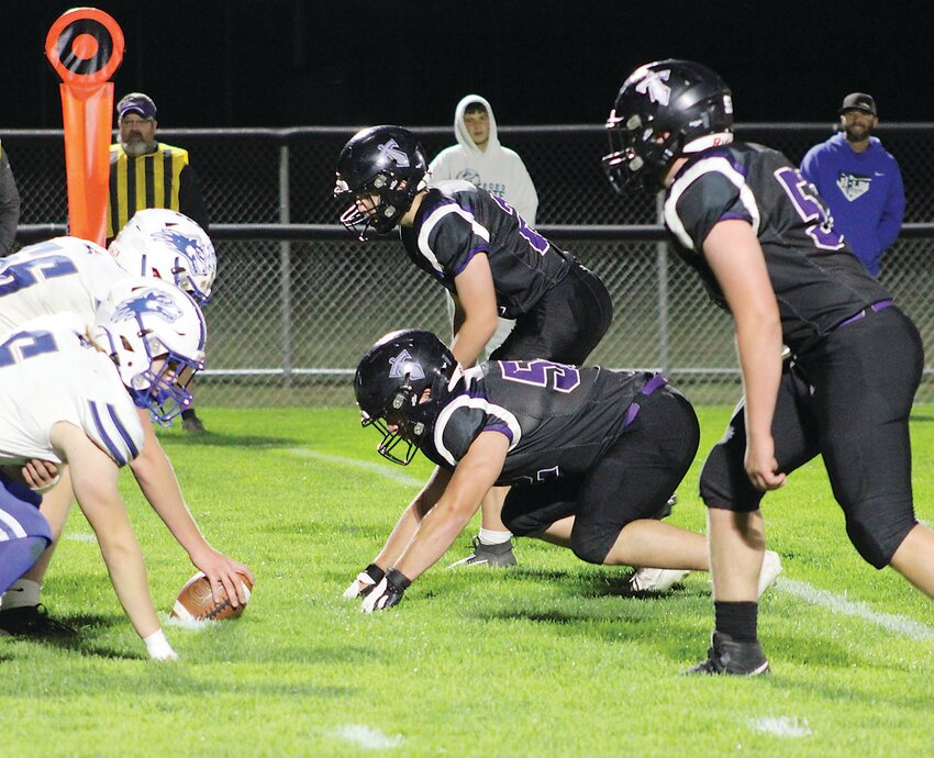 From left, Isaiah Malm, Wyatt Haffner and Luke Malm was the Graettinger-Terril/Ruthen-Ayrshire defensive front that helped hold Harris-Lake Park to 120 yards of offense in the Titans’ 58-8 win last Thursday in Ruthven.