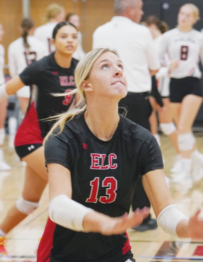 ELC’s Haley Nissen (13) gathers herself before leaping into the air for an attack during play at the Midgets’ Tournament on Saturday.