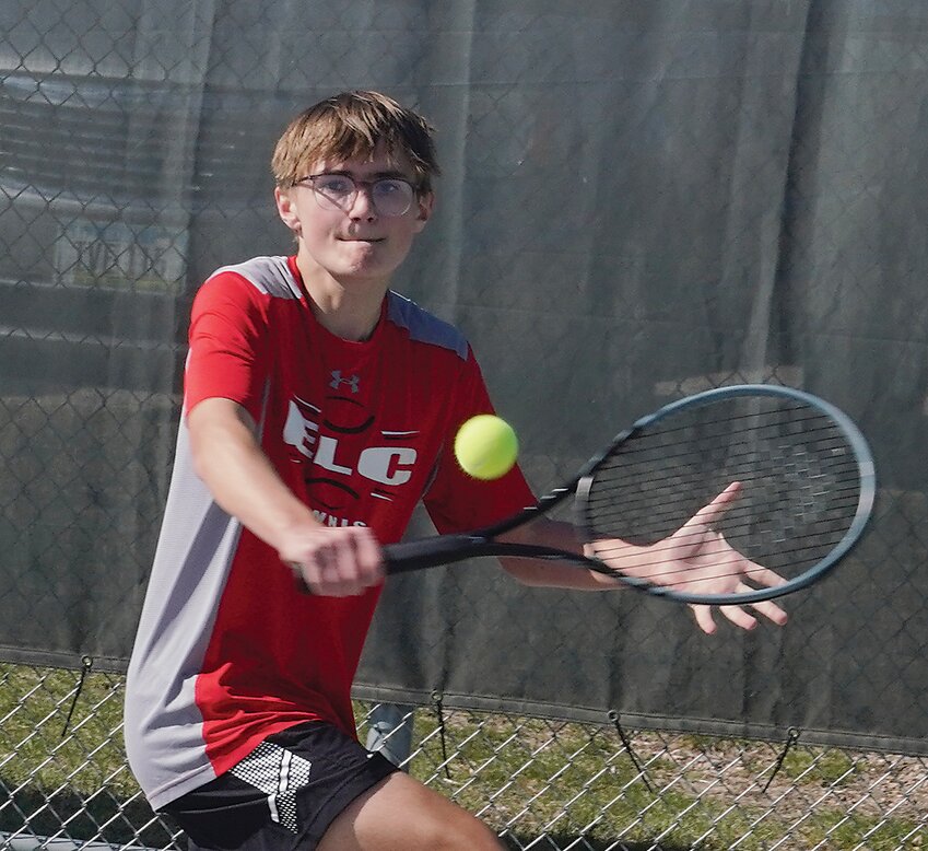 ELC&rsquo;s Zeke Funston is playing the top singles spot for the Midgets this season. Above, Funston hits a return during his match last week against Sergeant Bluff-Luton.