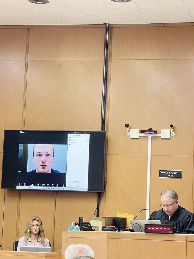 Lee Christensen appeared on camera from Anamosa State Penitentiary to testify under oath as to his current recollection of events that happened to cause the death of Thomas Bortvit on June 6, 2015. Judge Charles Borth presided over the trial.