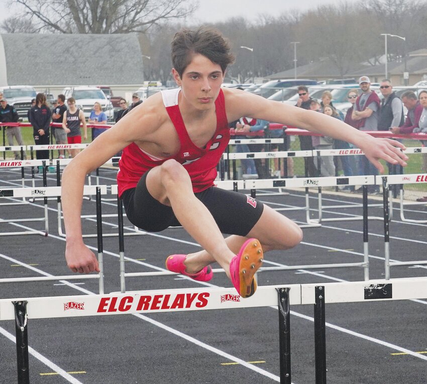 Blaize Ahrens runs a leg of the shuttle hurdle relay for ELC.