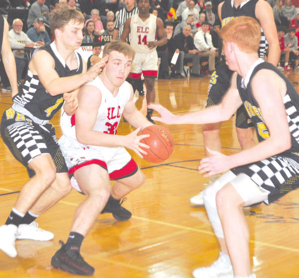 The Cherokee defense collapses on ELC’s Weston Shasteen during play on Tuesday in Estherville.
Photo by David Swartz