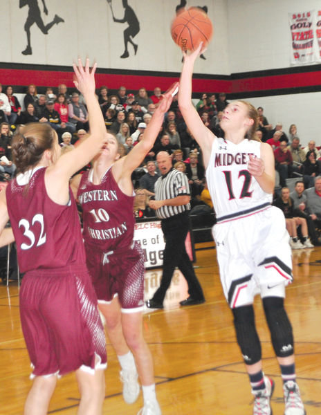 ELC sophomore Kaitlyn Tendal (12) became the team’s leading scorer with her 34-point effort against Storm Lake on Friday. The Midgets return home to host Graettinger-Terril/Ruthven-Ayrshire on Tuesday.
File photo